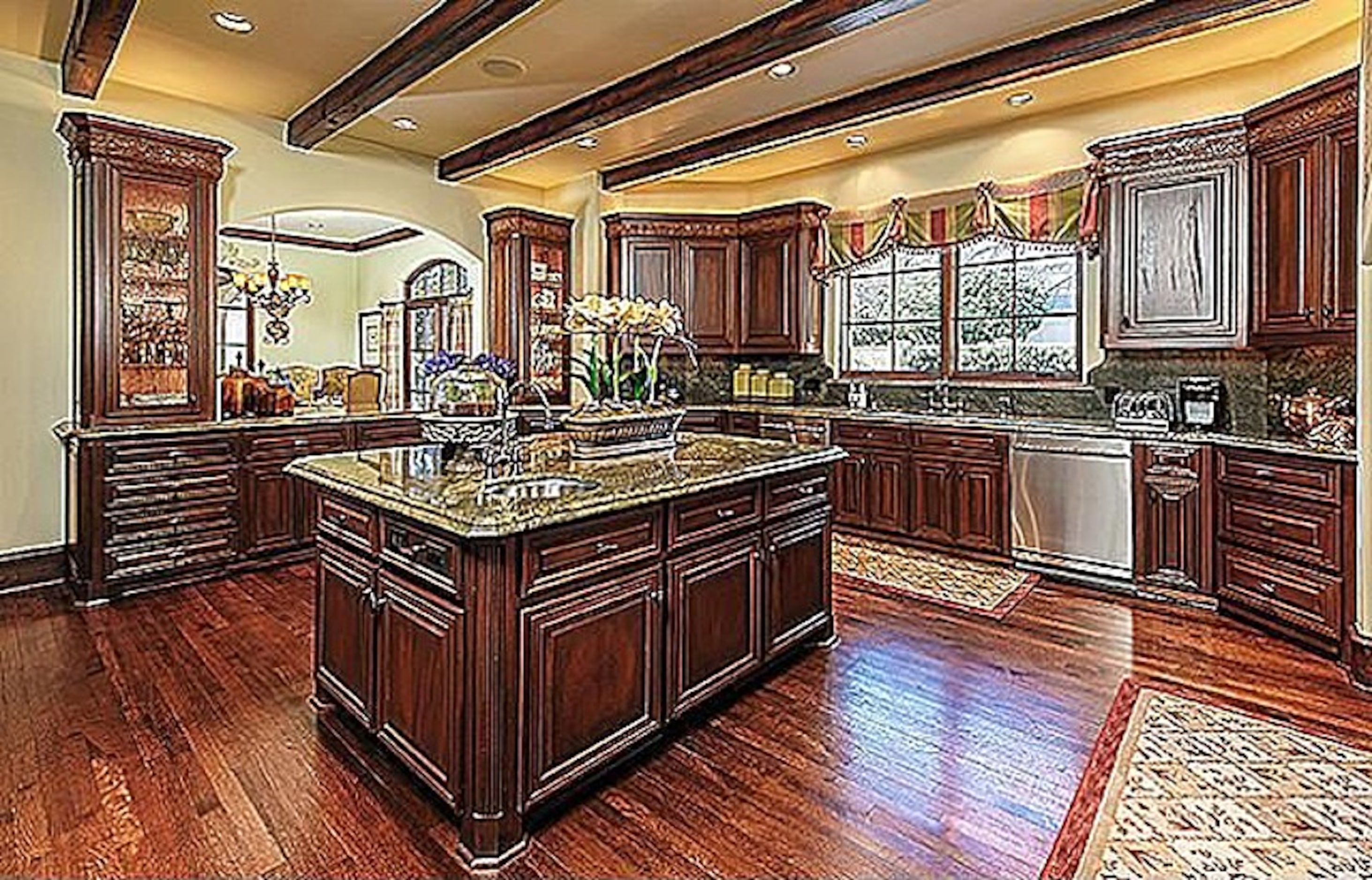 The home features a hardwood and marble kitchen with premieum appliances. 