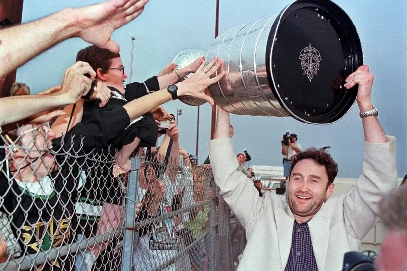 BEST OF BELFOUR: Stars goalie Ed Belfour shares the Stanley Cup with fans who went out to...