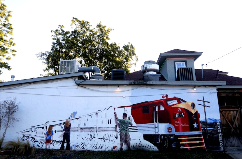 Patrick Ganino painted this train mural on the side of Didi's at Main Street in downtown...