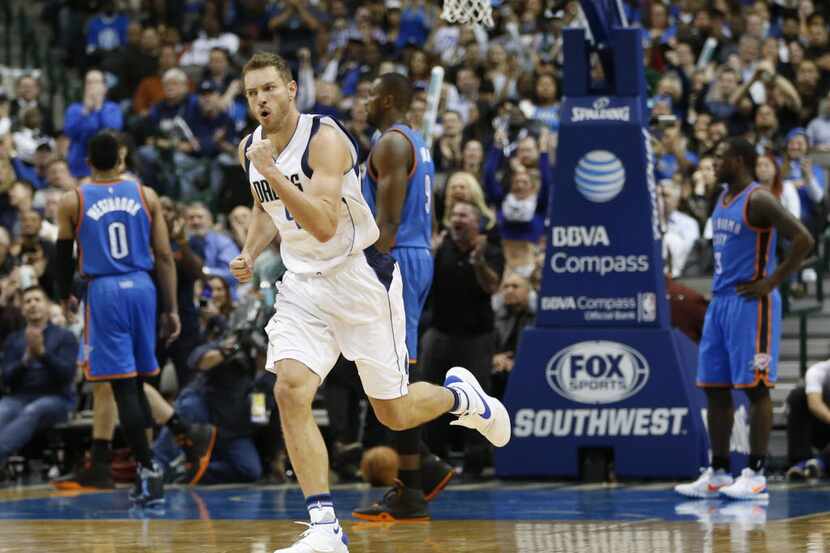 Dallas Mavericks forward David Lee (42) celebrates after a made basket during the second...