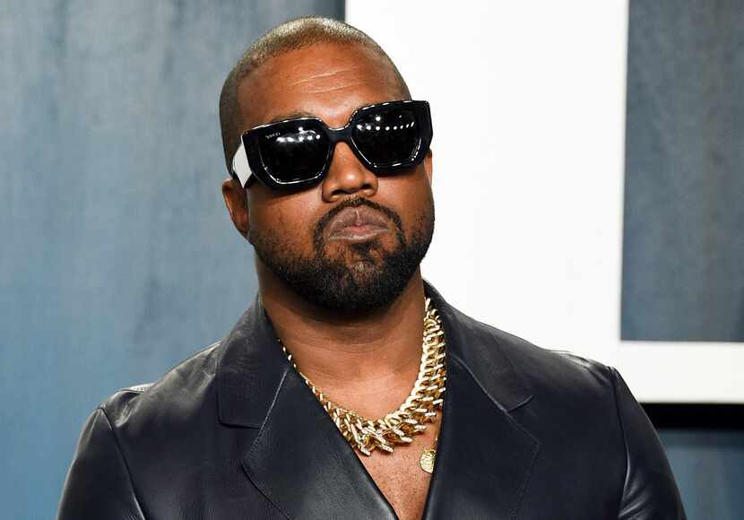 FILE - Kanye West arrives at the Vanity Fair Oscar Party on Feb. 9, 2020, in Beverly Hills,...
