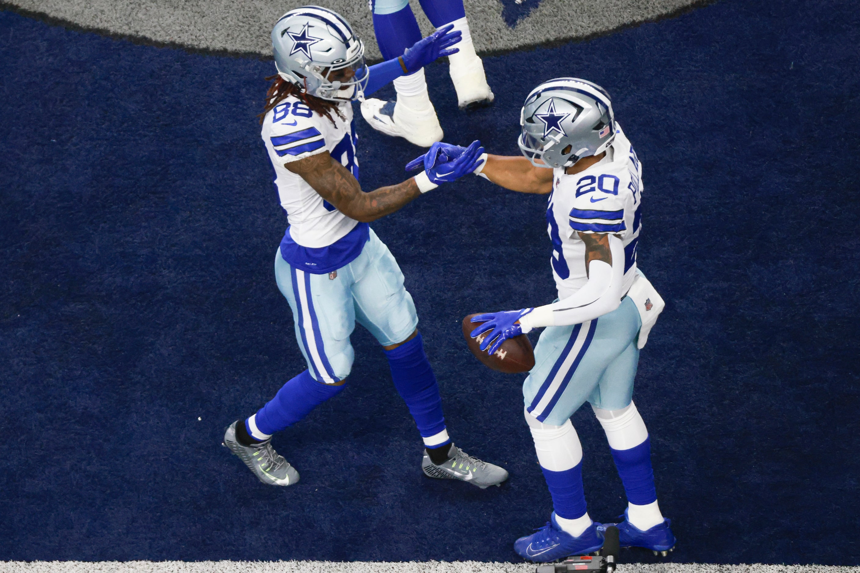 Dallas Cowboys wide receiver CeeDee Lamb (88) celebrates with Dallas Cowboys running back...