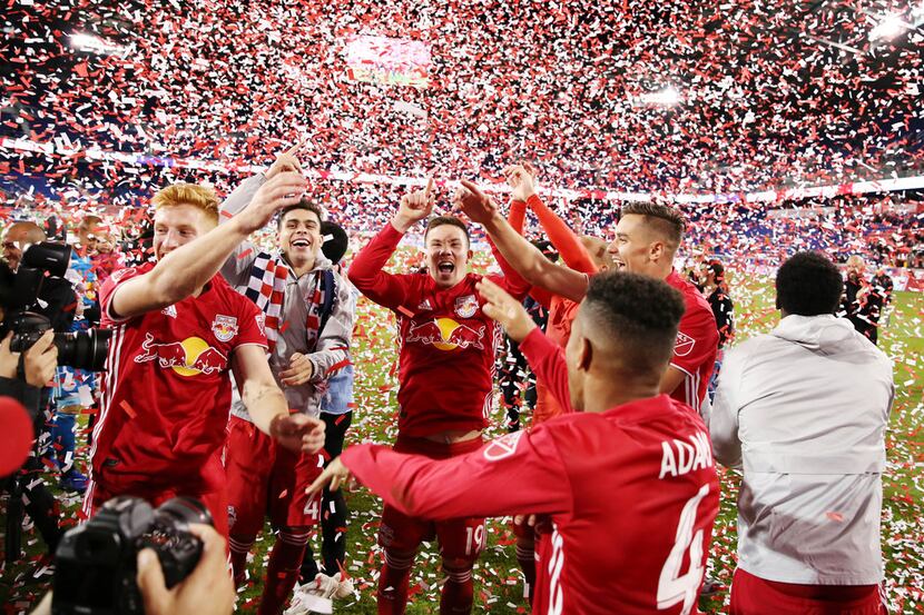 The New York Red Bulls celebrate after winning the 2018 Supporters' Shield, Sunday, Oct. 28,...