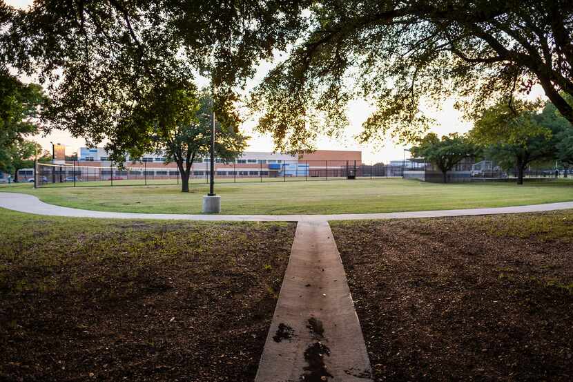 A drainage culvert meets a sidewalk just north of the tennis courts at Ferguson Park. This...