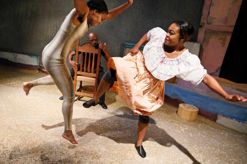 
From left: Jamila Marie, J.R. Bradford (background) and Dominique Edwards perform a scene...