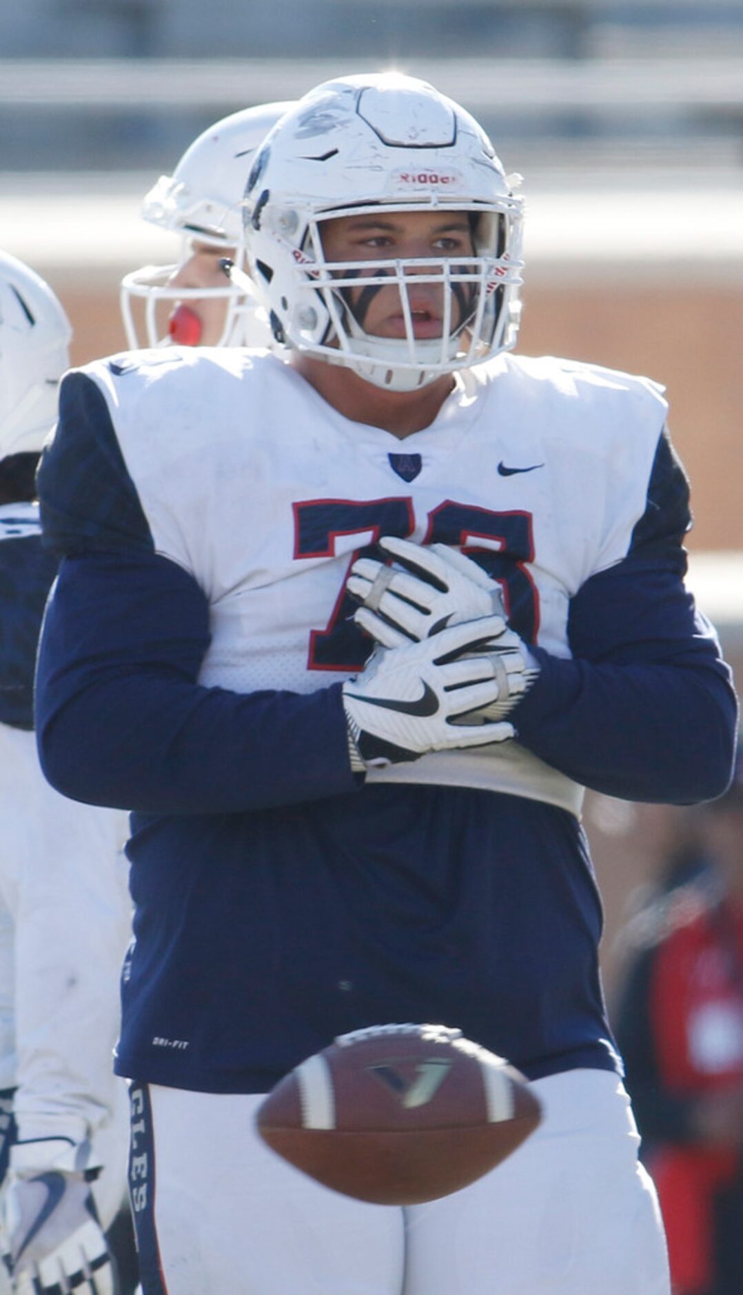 Allen offensive lineman Mason Grosser (73) glances to the sideline between plays as a new...