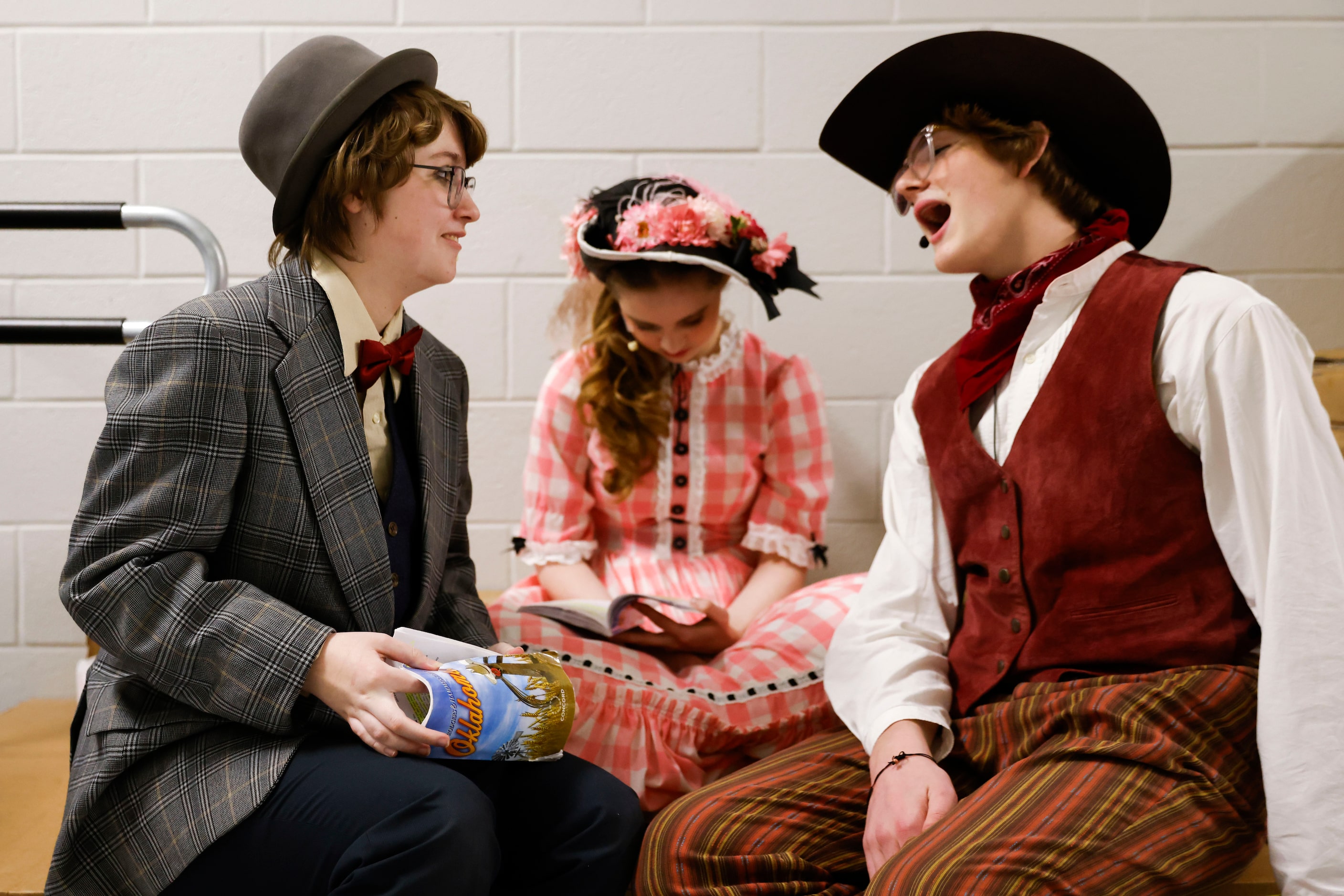 From left, cast members Max Hightower, Avery Tollison, and Aiden Hill, read and practice...