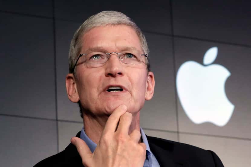 FILE - In this April 30, 2015, file photo, Apple CEO Tim Cook responds to a question during...