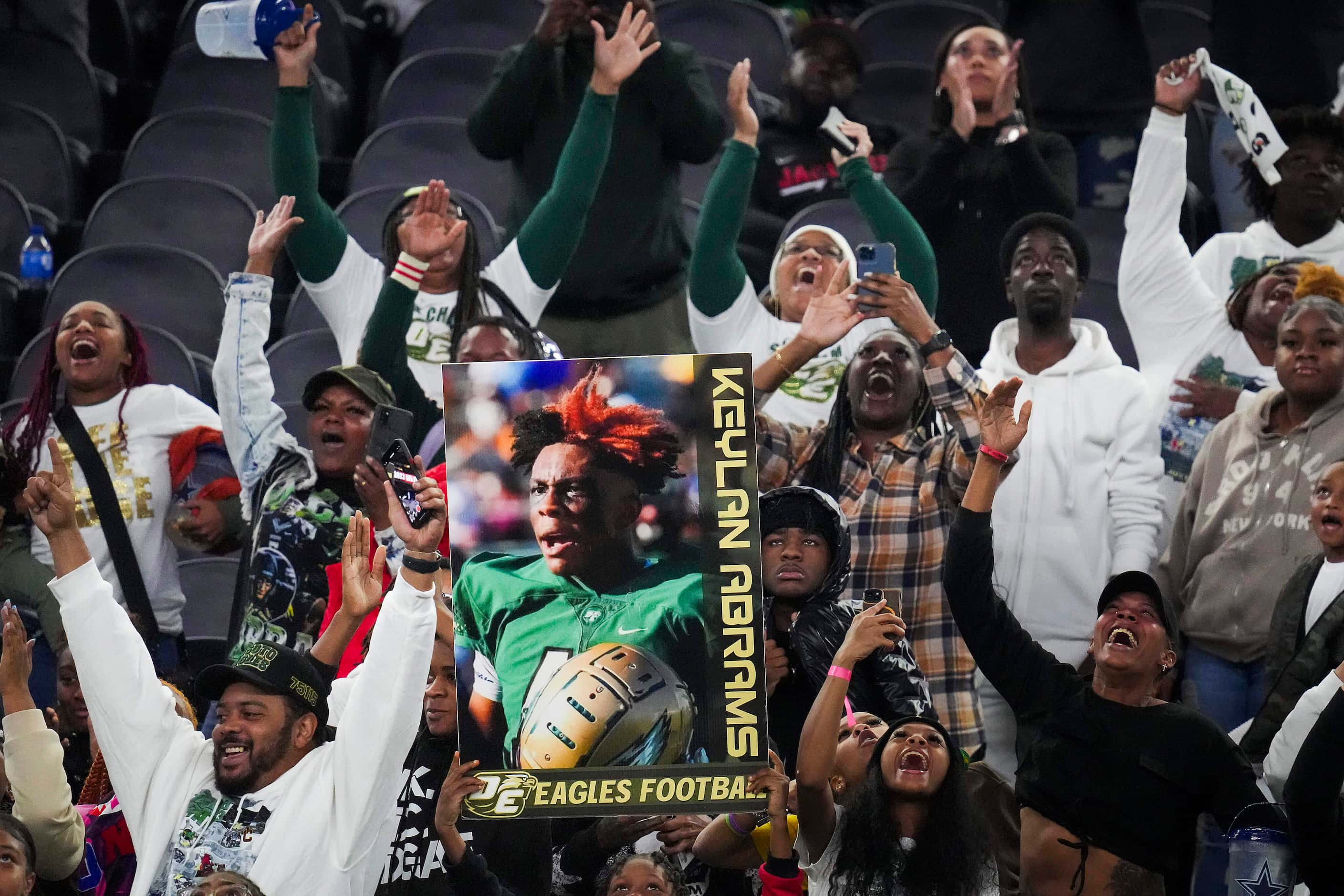 DeSoto fans cheer as defensive lineman Keylan Abrams is announced as the defensive MVP after...