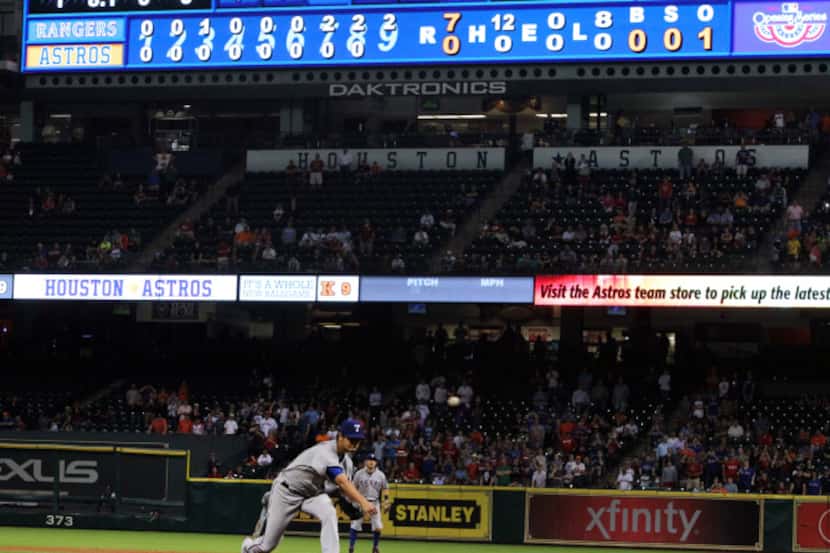 Yu Darvish throws a ninth-inning pitch during the Texas Rangers vs. Houston Astros MLB...