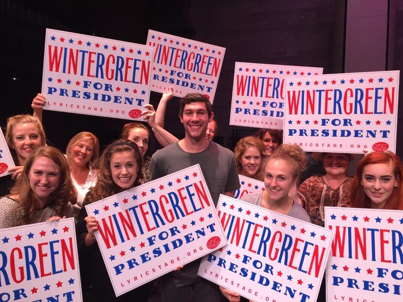Drew Shafranek stars as presidential candidate John P. Wintergreen, surrounded by beauty...
