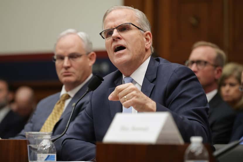 Federal Aviation Administration acting Administrator Daniel Elwell (C) testifies during a...