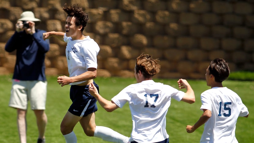 Frisco Lone Star forward Bartek Zabek (11) leaps after scoring during first half action...