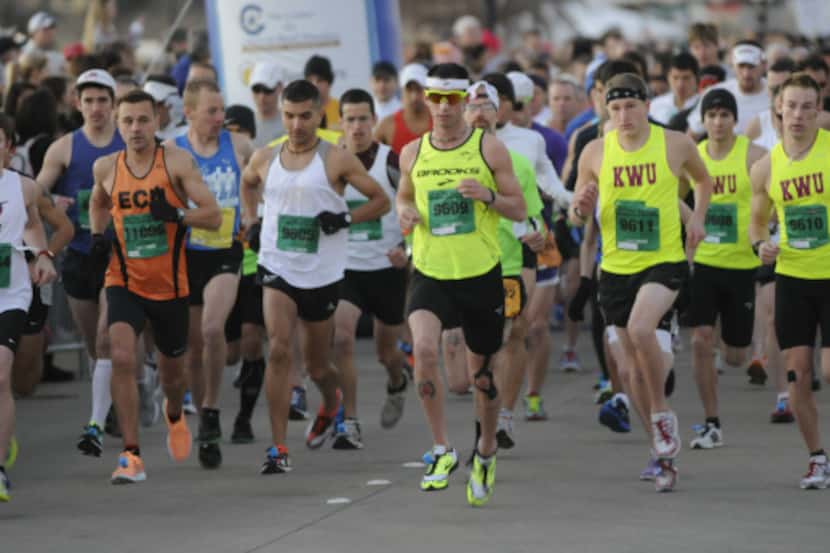 Elite runners begin The Cowtown Marathon and Half Marathon in Ft. Worth on Sunday, Feb. 26,...