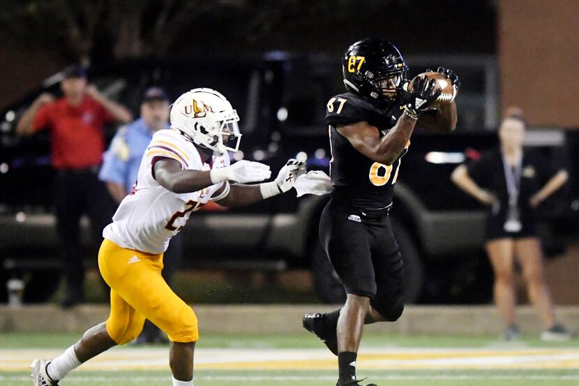 Southern Mississippi wide receiver Tim Jones catches the ball in a game against...