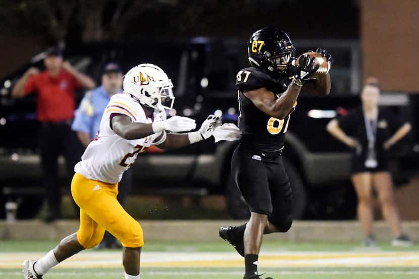 Southern Mississippi wide receiver Tim Jones catches the ball in a game against...
