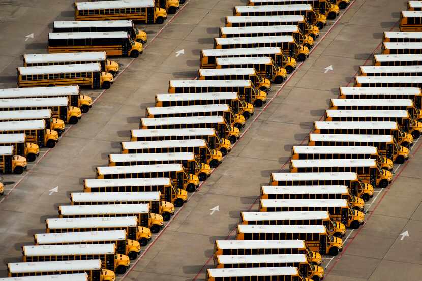 Aerial view of parked school buses at the Dallas ISD Student Transportation Services' North...