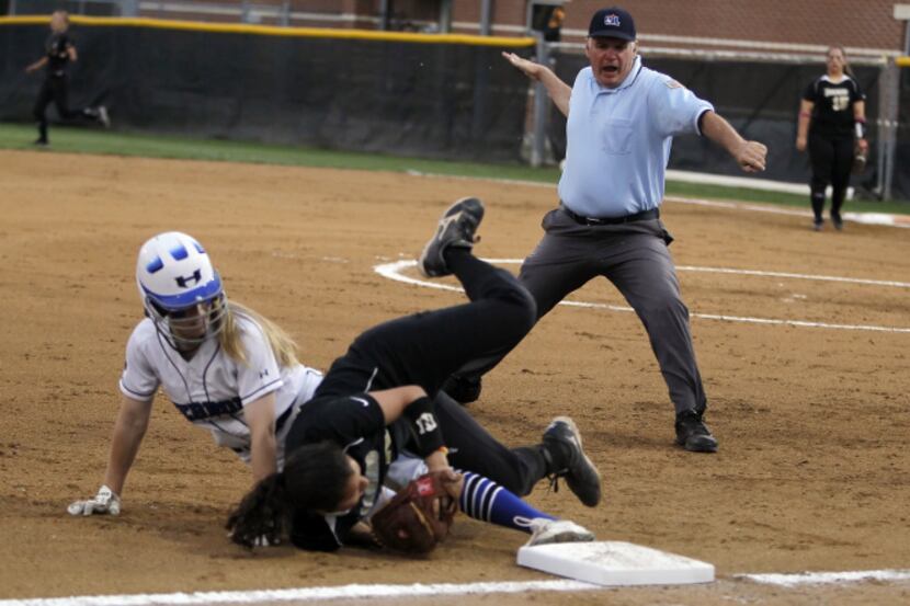 Irving third base junior Daisy Martinez (10) makes the tag to force out Hebron freshman...