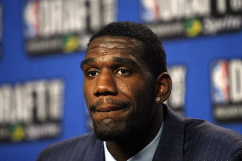  Ohio State's Greg Oden takes questions in the interview room after being selected by the...