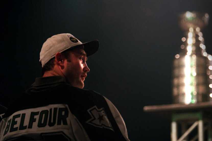  Dallas goalie Eddie Belfour enjoys the festivities on stage during the Stanley Cup...