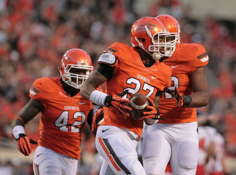 Nov 17, 2012; Stillwater OK, USA; Oklahoma State Cowboys linebacker Lyndell Johnson (27)...