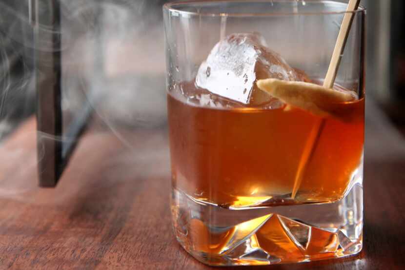 Smoked Old Fashioned at Haywire in Plano, Texas on Thursday, Nov. 30, 2017. (Rose Baca/The...