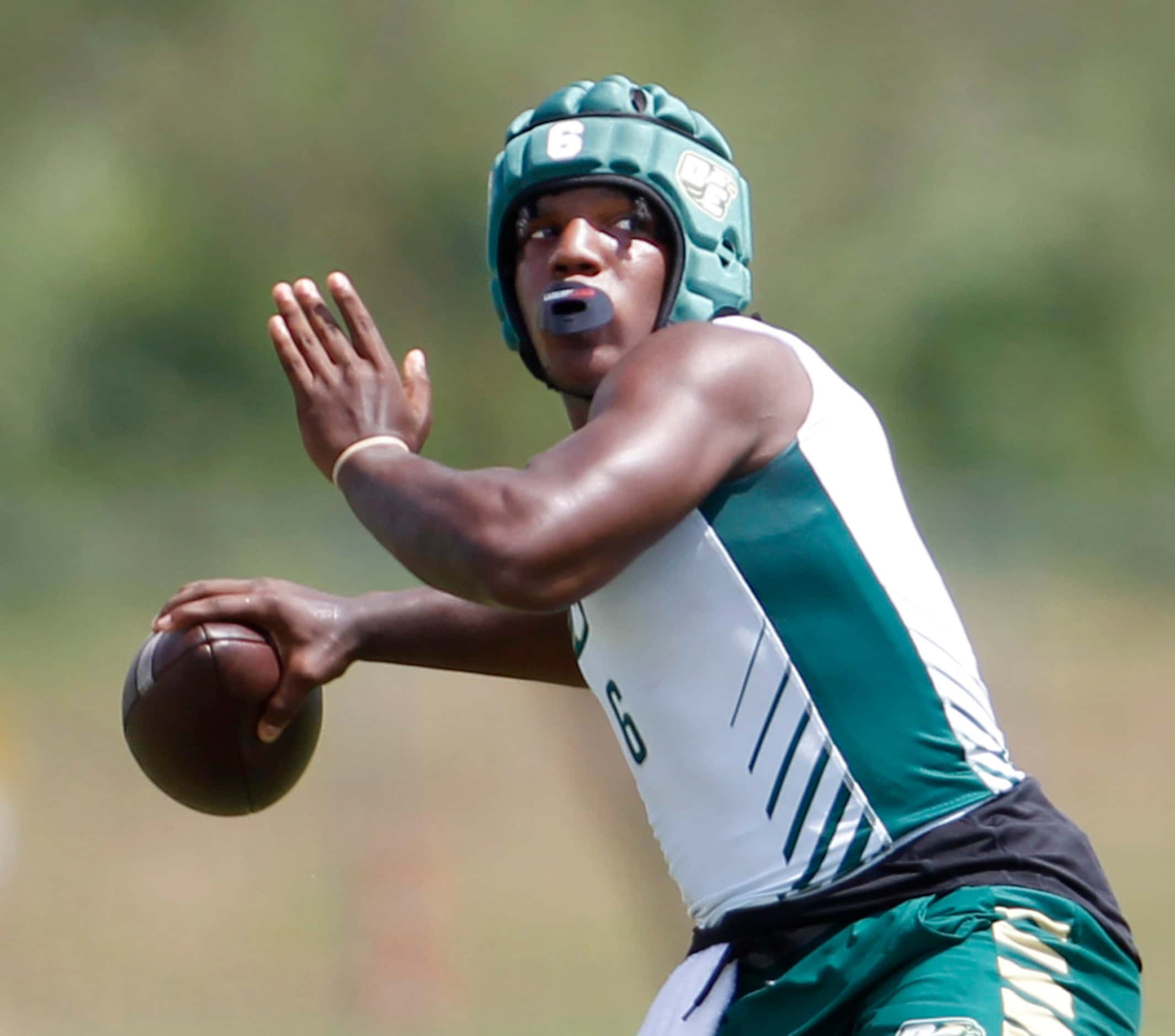 DeSoto quarterback Matt Allen (6) prepares to launch a long pass during day 1 of competition...