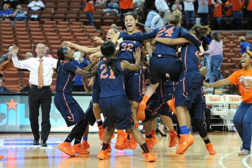 
McKinney North celebrates a win over Brennan after the UIL 4A state semi-final girls...