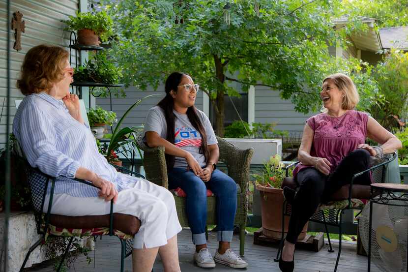 Karen Roberts (from left), Sarah Mendoza and Jeanne Chvosta, on Roberts' front porch, are...