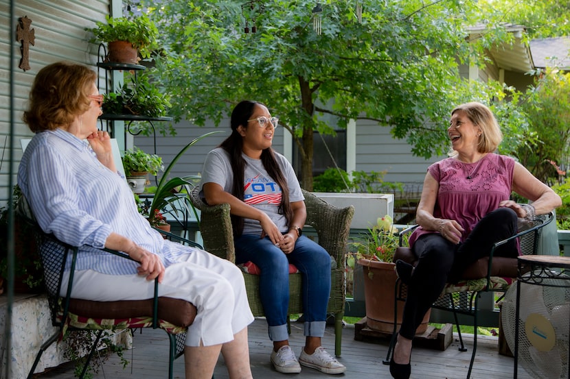 Karen Roberts (from left), Sarah Mendoza and Jeanne Chvosta, on Roberts' front porch, are...