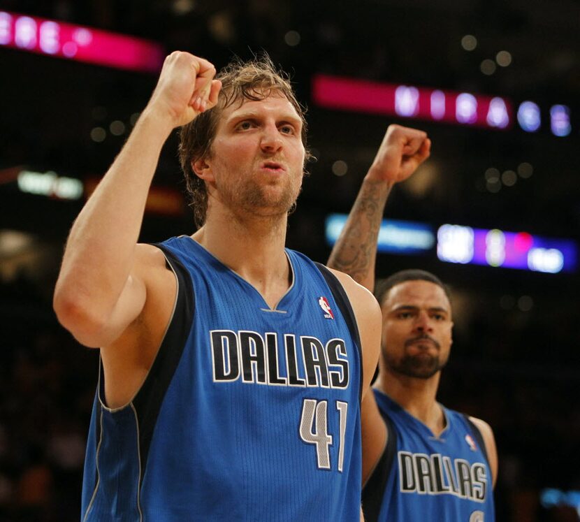 Dallas Mavericks power forward Dirk Nowitzki (41) and Dallas Mavericks center Tyson Chandler...