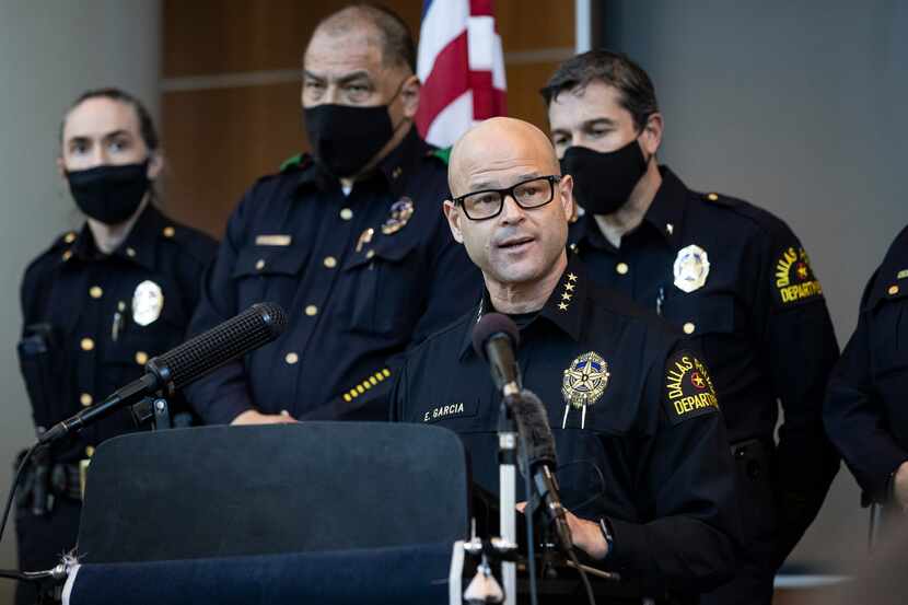 Chief Eddie García (center) speaks with media during a press conference regarding the arrest...