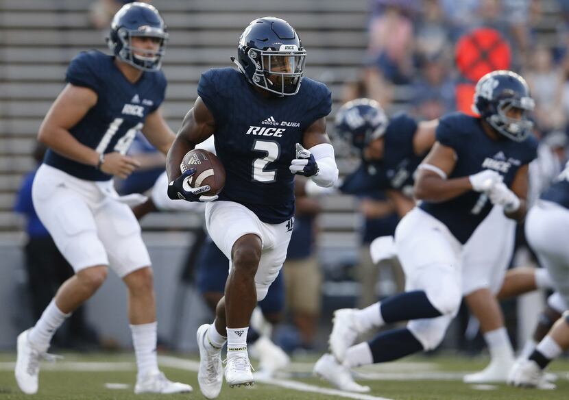 HOUSTON, TX - SEPTEMBER 23:  Austin Walter #2 of the Rice Owls runs the ball in the first...