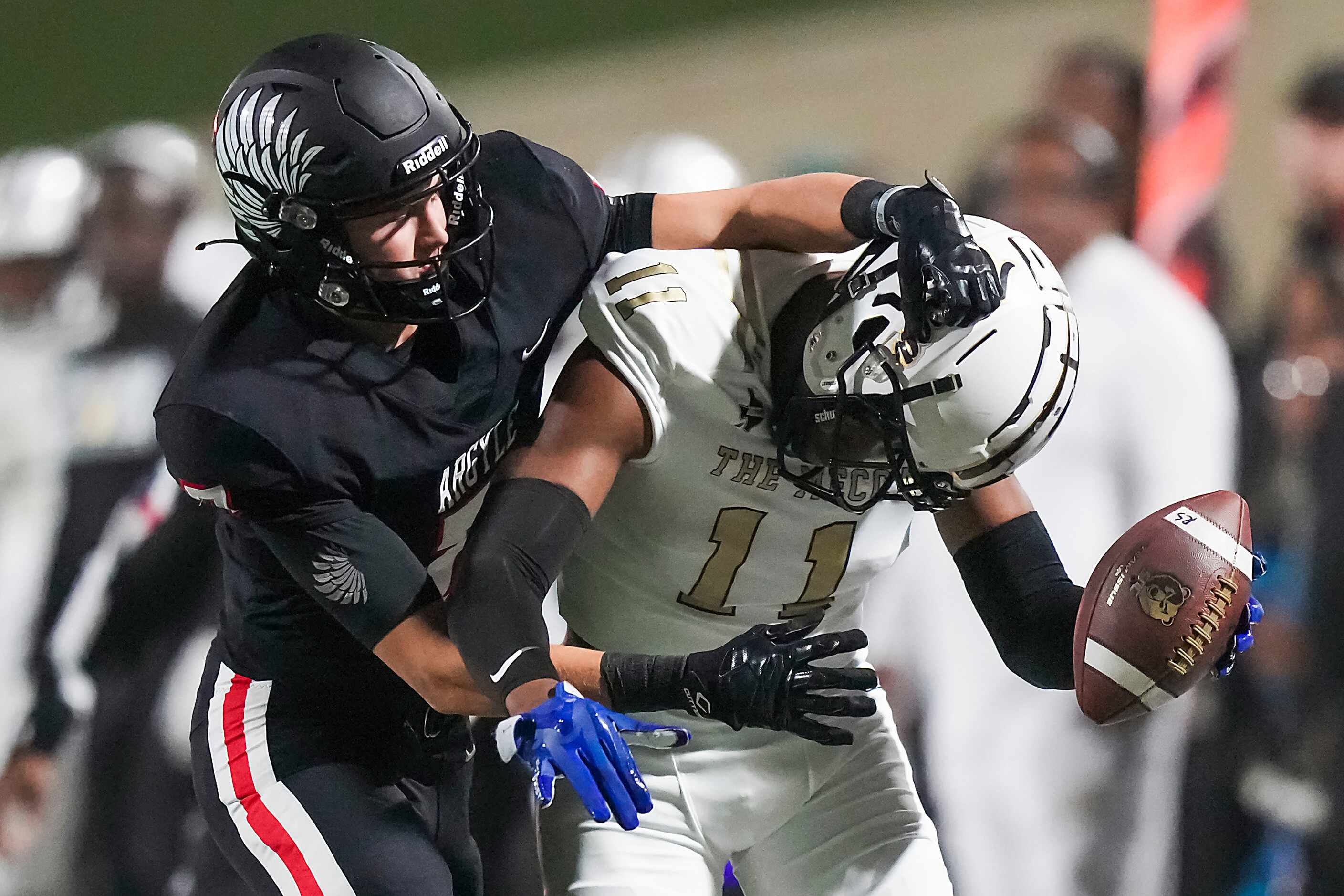 South Oak Cliff Jamyri Cauley (11) is pushed out of bounds by Argyle defensive back Micah...