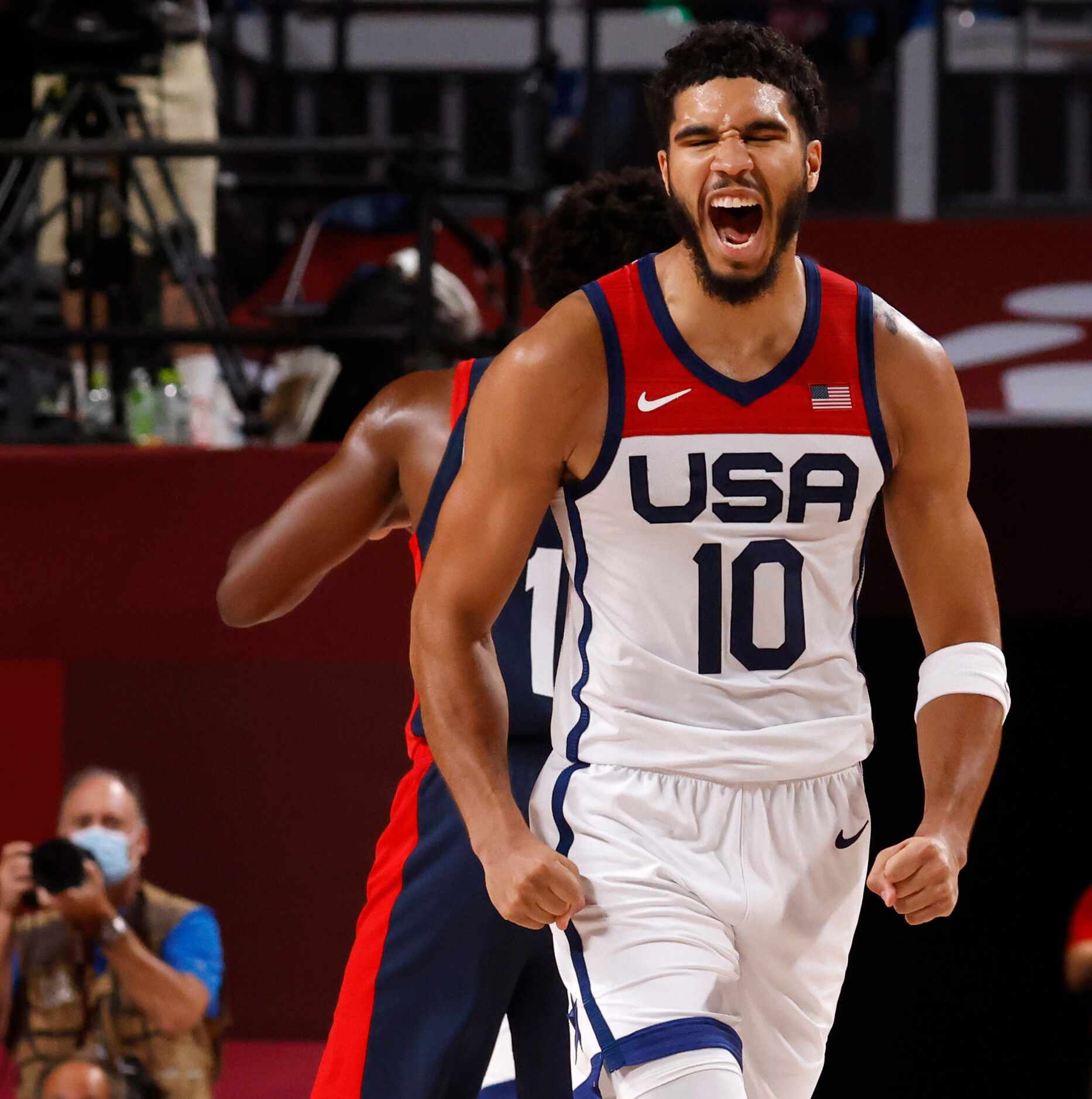 USA’s Jayson Tatum (10) celebrates after hitting a three pointer in a game against France...