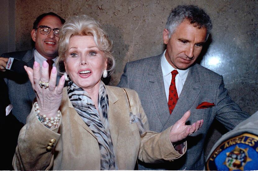  In a May 1, 1990 file photo, Zsa Zsa Gabor gestures as she while answering questions as she...