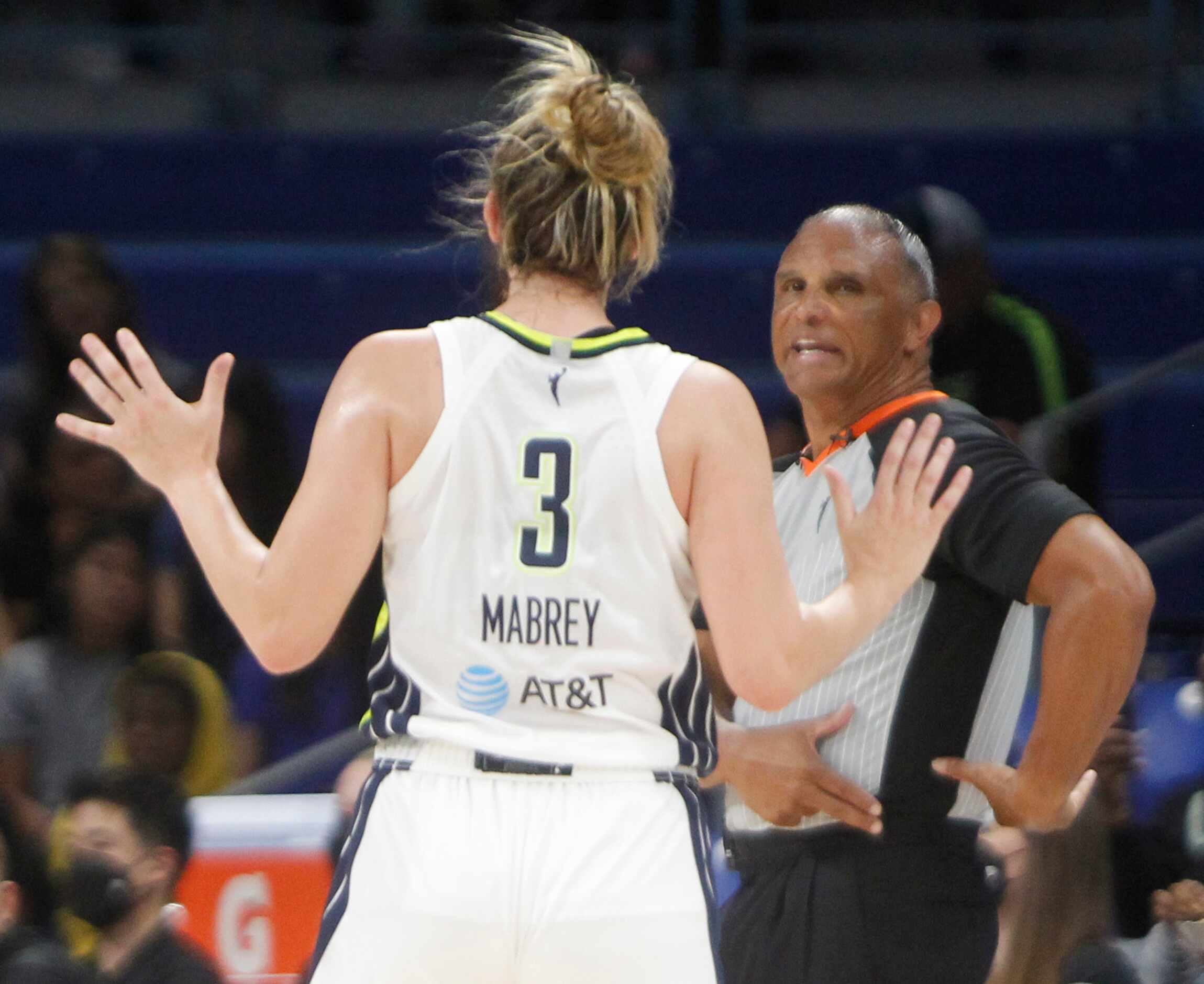 Dallas Wings guard Marina Mabrey (3) questions a foul call by a game official during second...