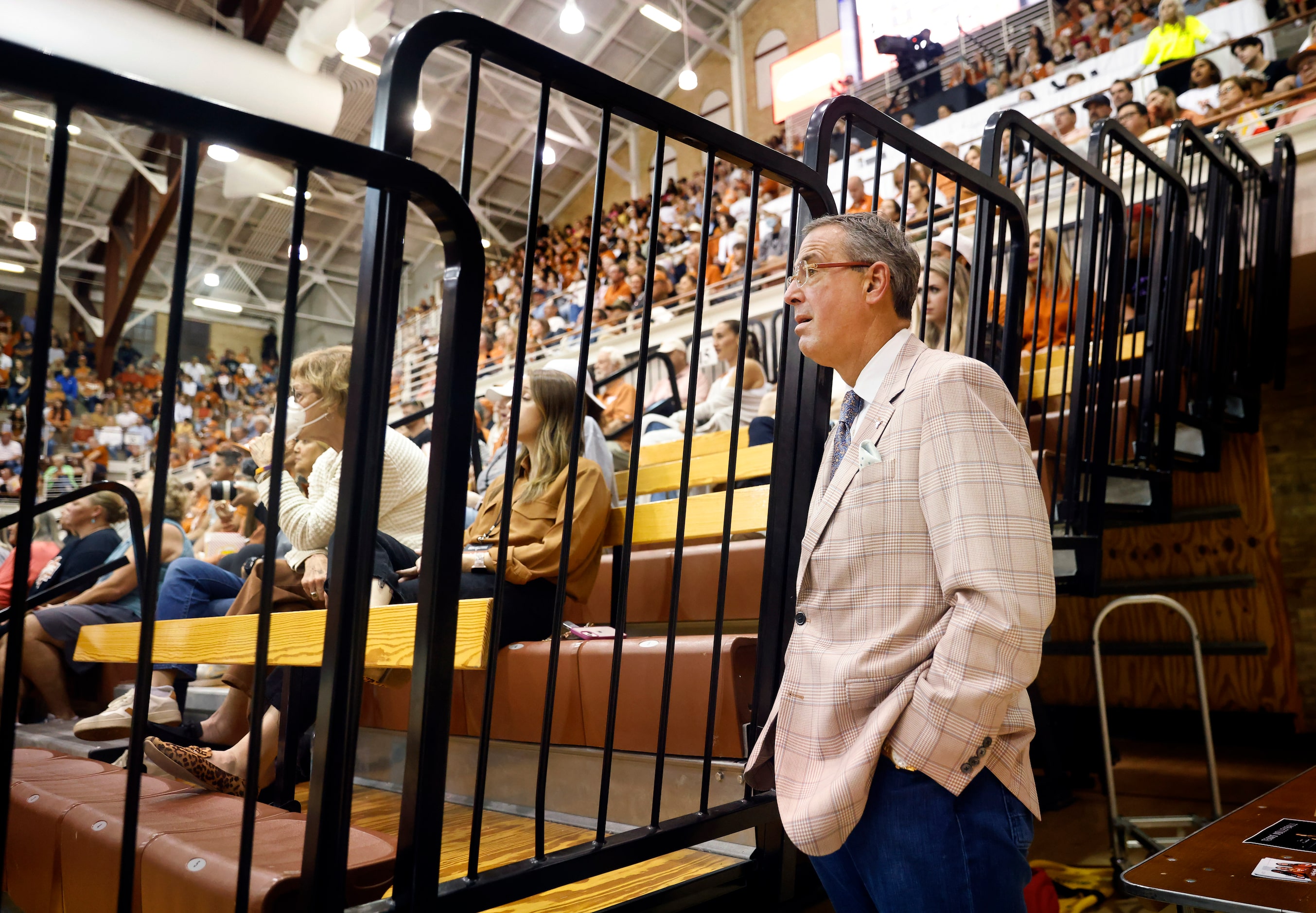 University of Texas Athletic Director Chris Del Conte makes a quiet entrance to see the...