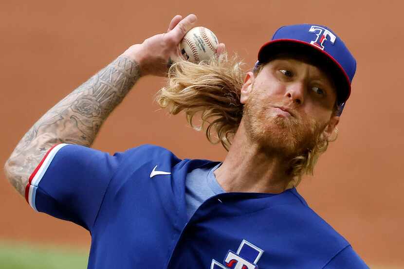 Texas Rangers starting pitcher Mike Foltynewicz (20) throws against the Milwaukee Brewers in...