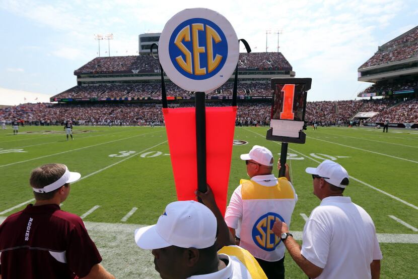 The SEC down-and-distance sticks are pictured along the sidelines during the University of...