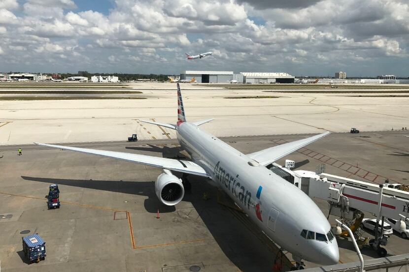 An American Airlines flight takes off from Miami International Airport on March 28, 2017. 
...