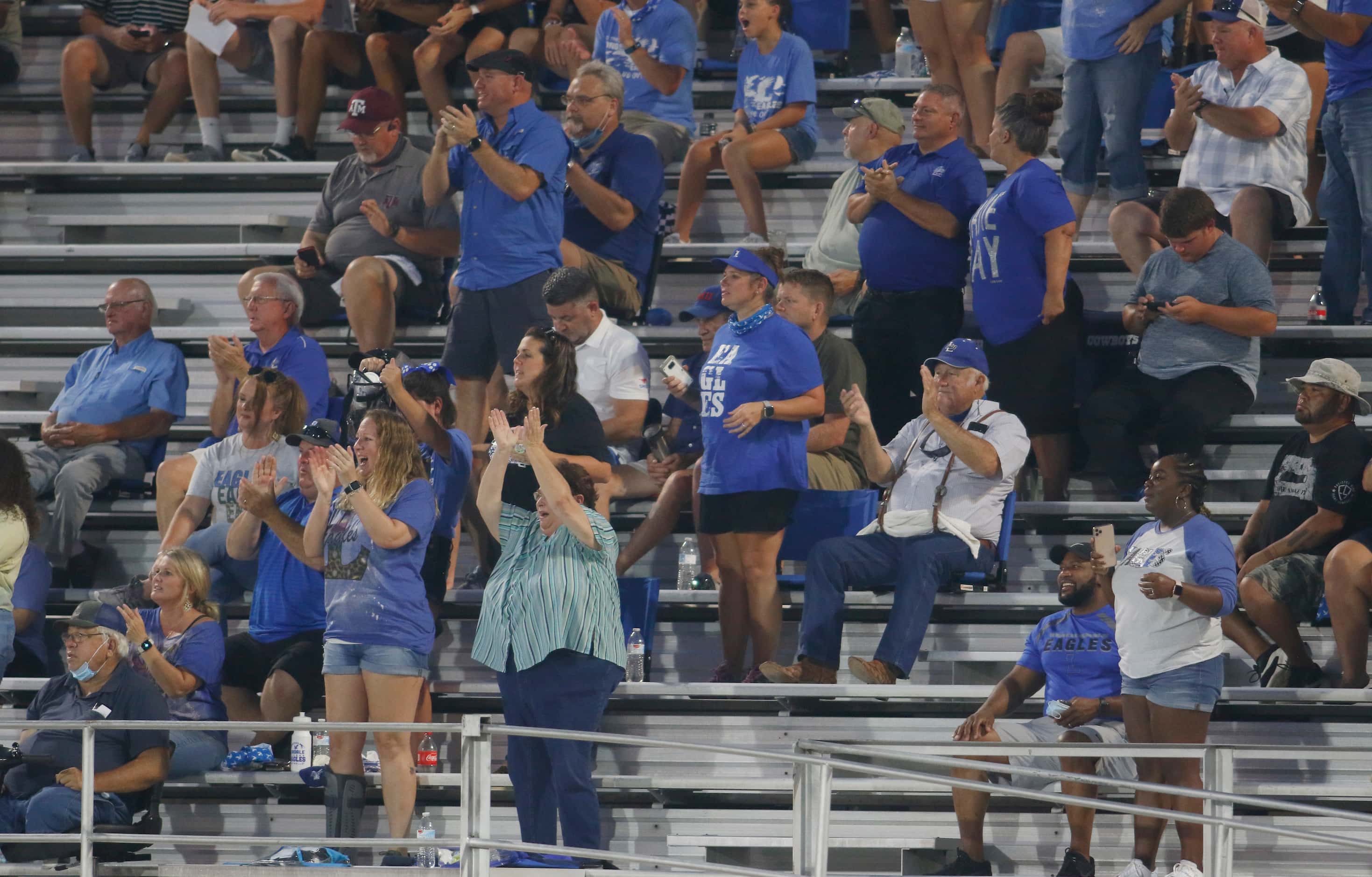 Lindale fans cheer a big play during first half action against Kaufman. The Class 4-A...