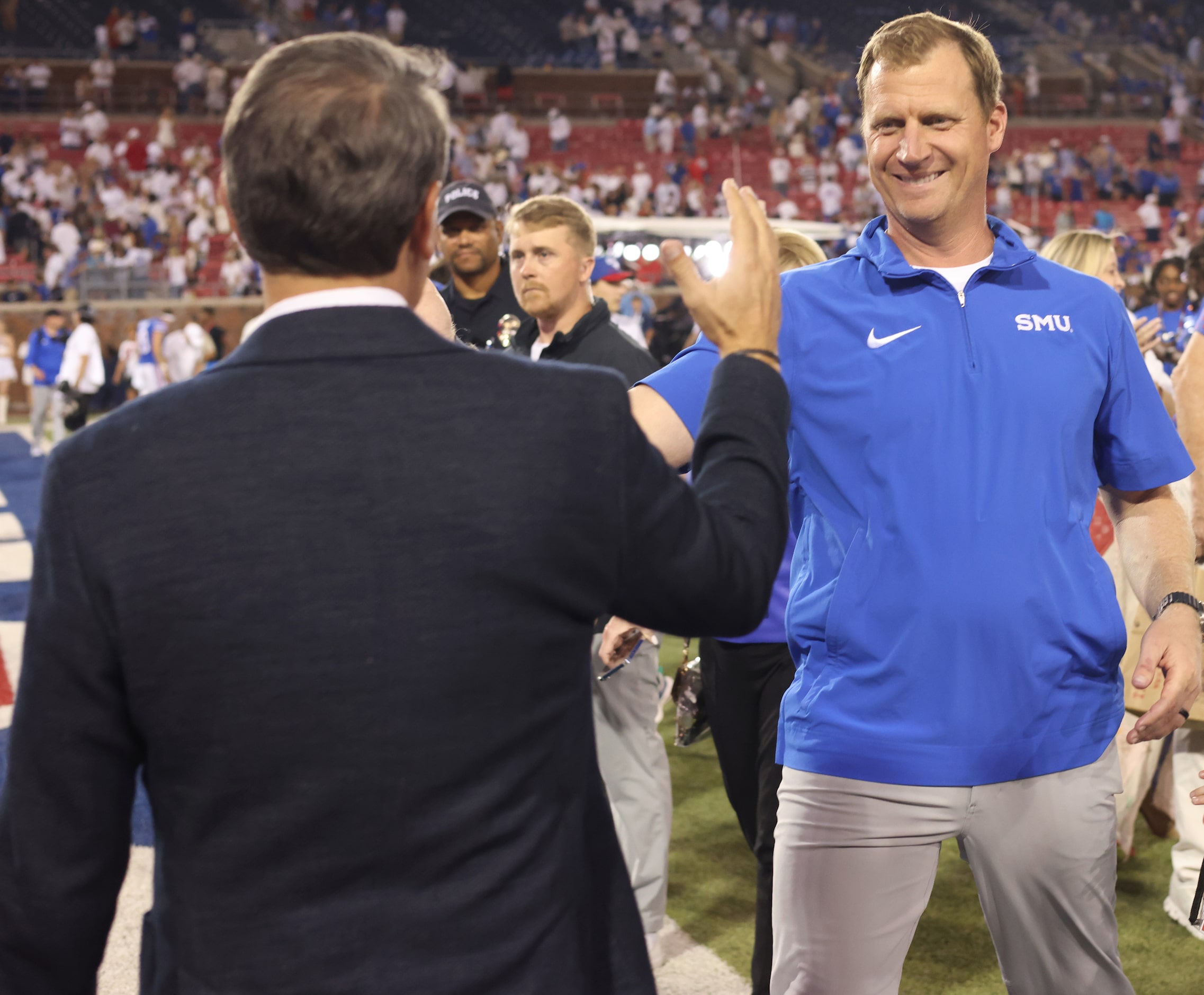 SMU Mustangs head coach Rhett Lashlee, right, was all smiles ag=fter his team defeated...