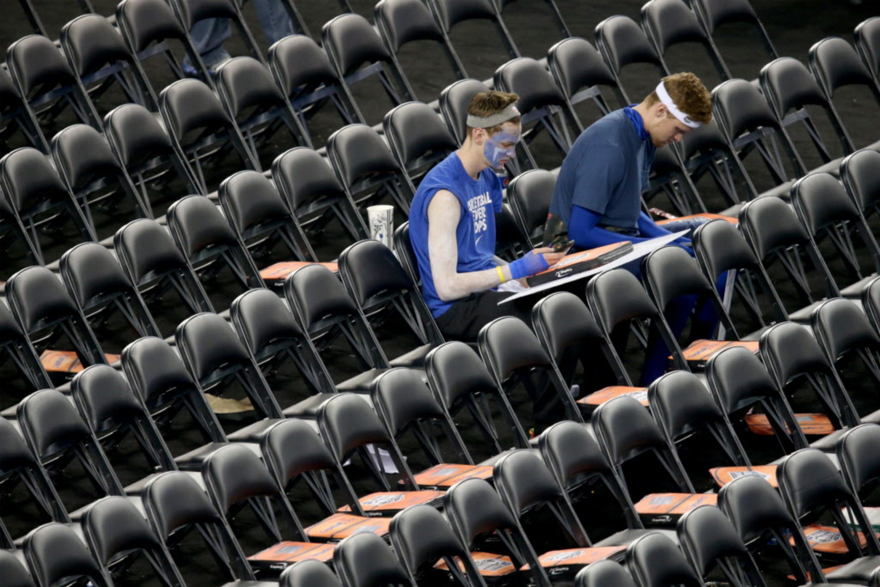 Kentucky fans sits alone in the student section after loosing against the Connecticut...