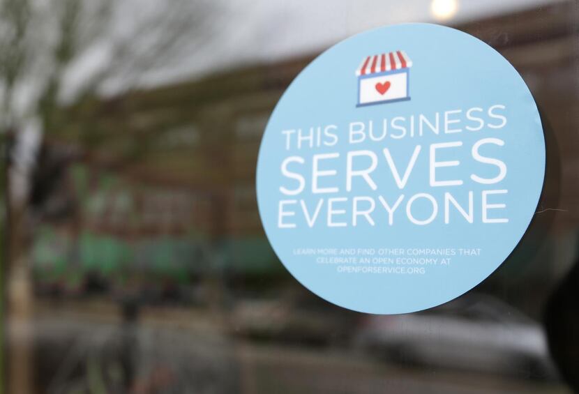 
A window sticker on a downtown Indianapolis business in March 2015, shows its objection to...