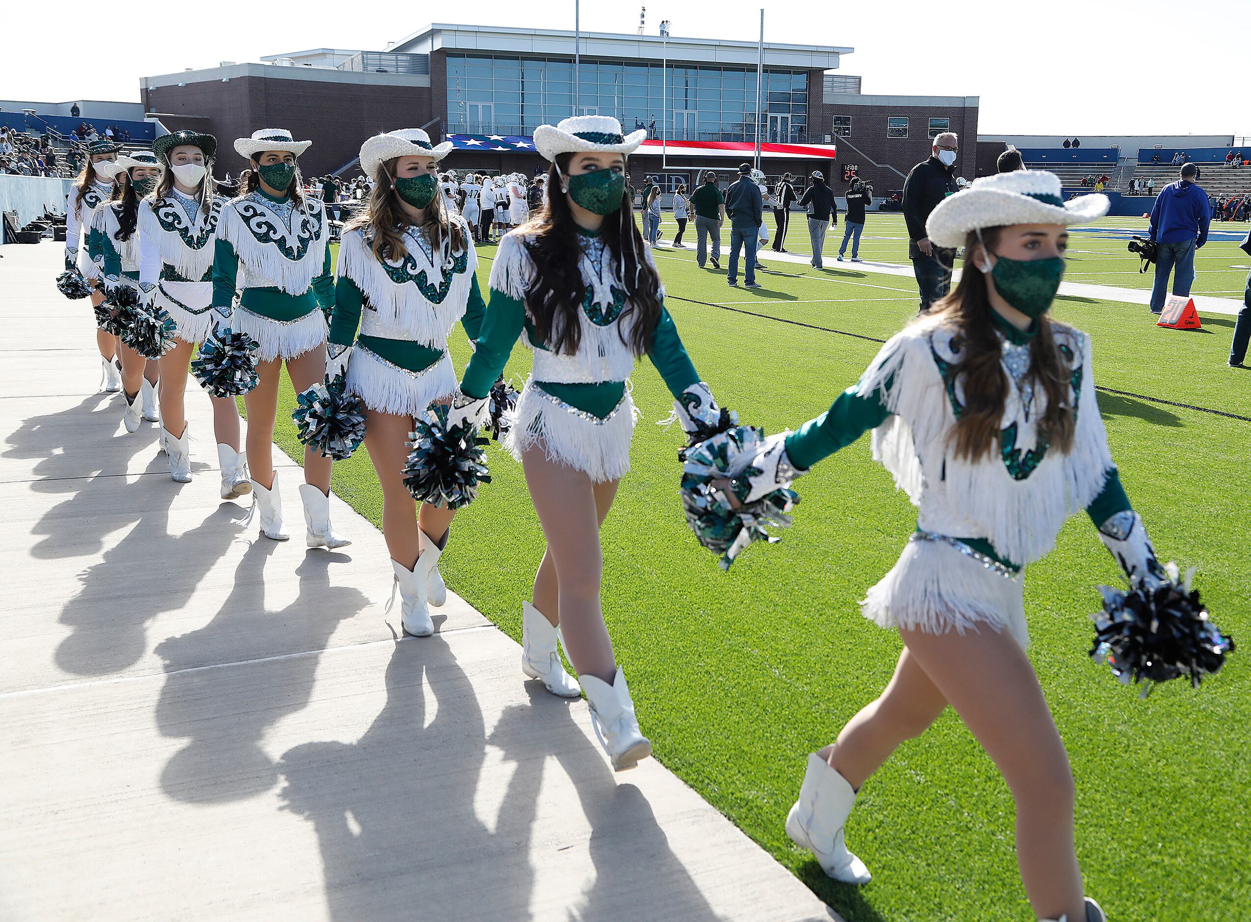 The Prosper High School Tallonettes take the field as Prosper High School played Denton...