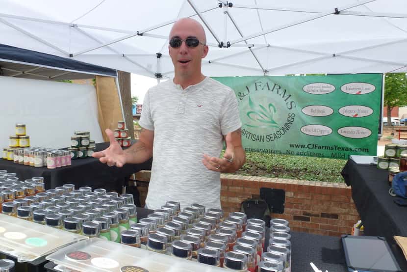 Matthew Tyler helps sell his family's C&J Farms artisan seasonings at the Mesquite and...