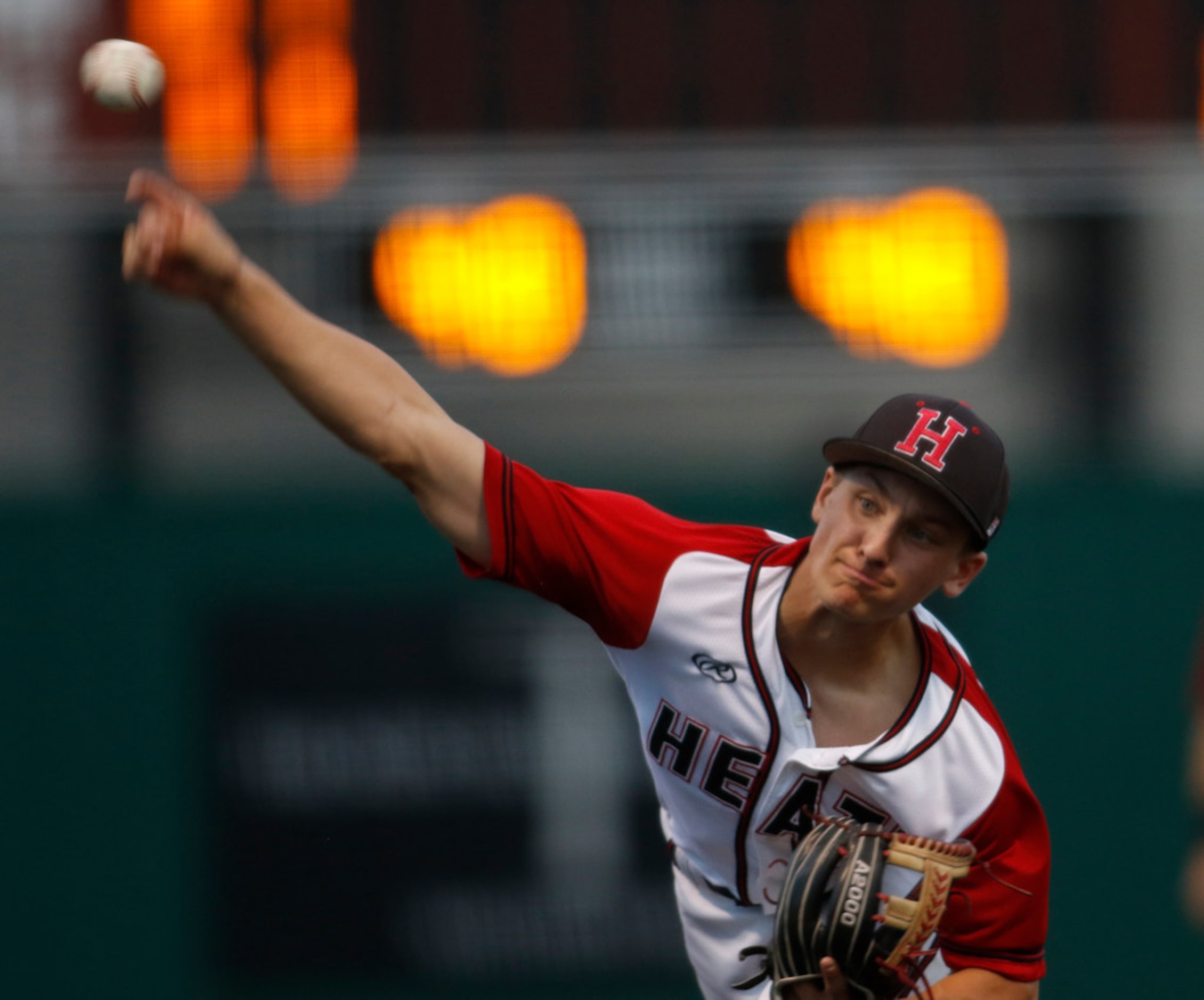 Rockwall Heath pitcher Jett Williams (4) launches a fastball during the 3rd inning of play...