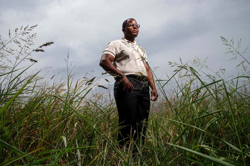 Sr. Cpl .Larry Moody poses for a portrait in field near his Forney  home on Aug. 27.. City...