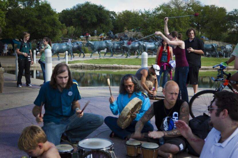 Occupy Dallas protesters have occasional drum circles in Pioneer Plaza. The loose-knit group...